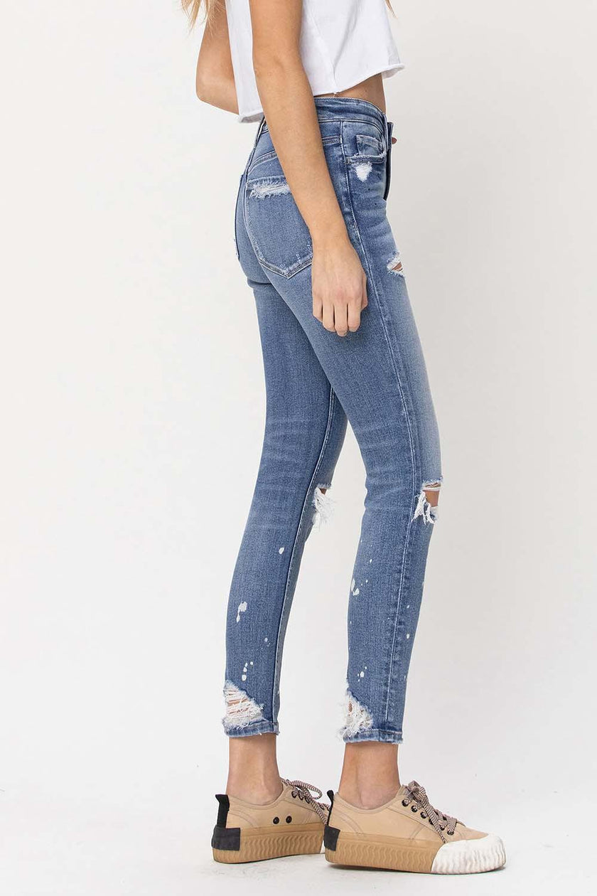 MID RISE DISTRESSED PAINT SPLATTER SKINNY JEANS