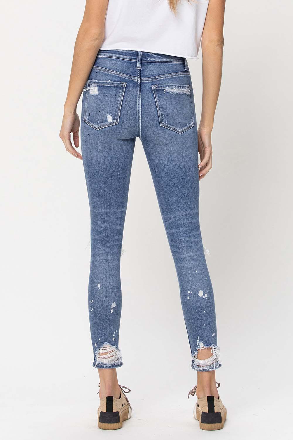 MID RISE DISTRESSED PAINT SPLATTER SKINNY JEANS